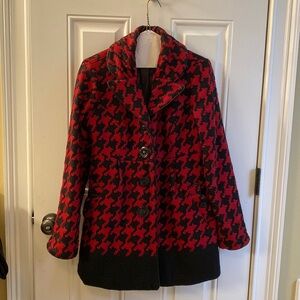 Garnet and black houndstooth coat.